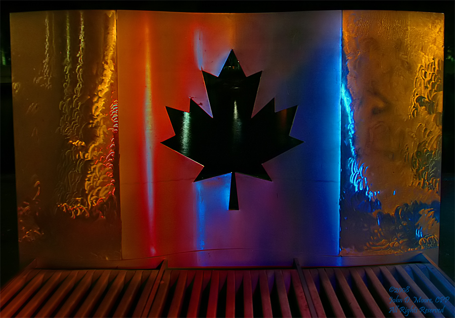 A stainless steel sculpture of the Canadian flag.