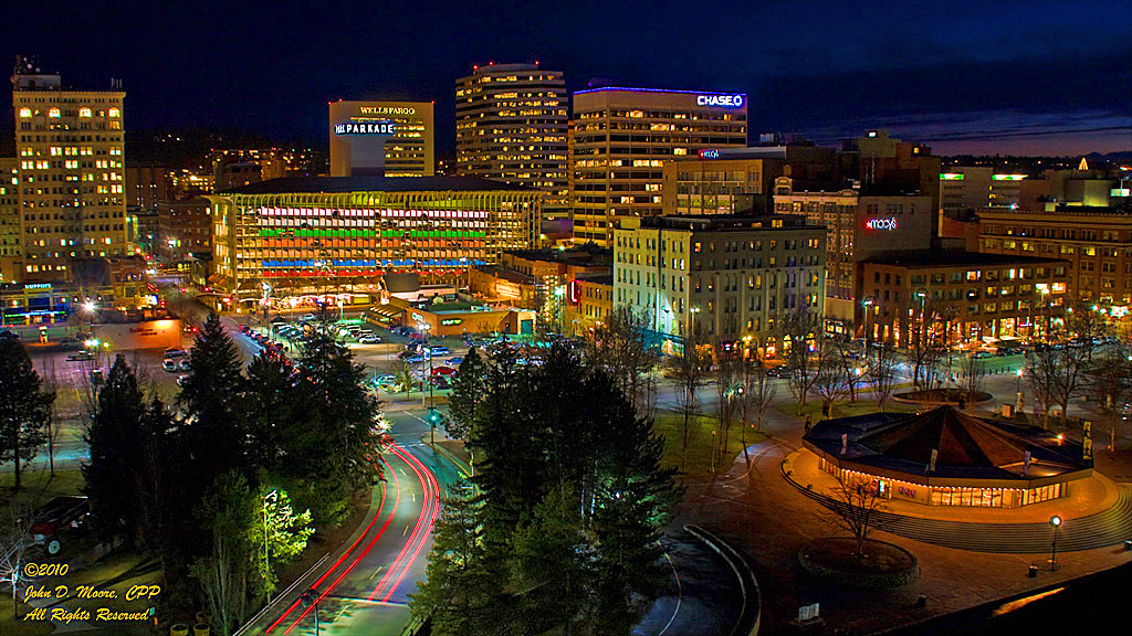 A view into downtown Spokane, shot from the top of Spokane's Riverfront Park Clocktower.  The Parkade is the very colorful parking structure in the center of the image.  Spokane, Washington.
