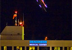 South view of a helicopter arriving at Deaconess Medical Center,