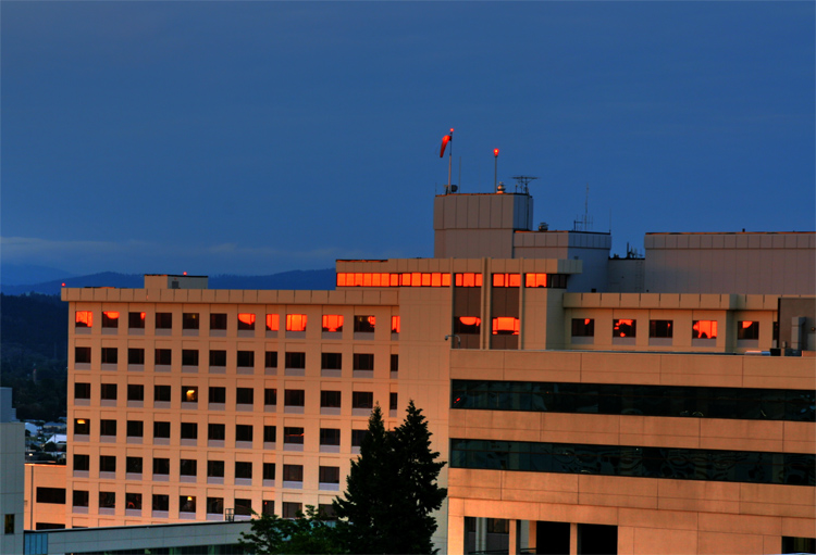 Sunset reflects from the windows at Sacred Heart Medical Center